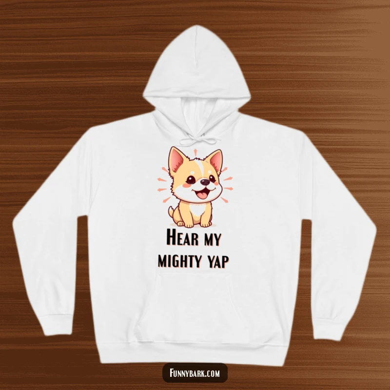 Funny hoodie featuring a small dog mid-yip, with its mouth open and vibrant sound waves emanating, designed for warmth and humor.