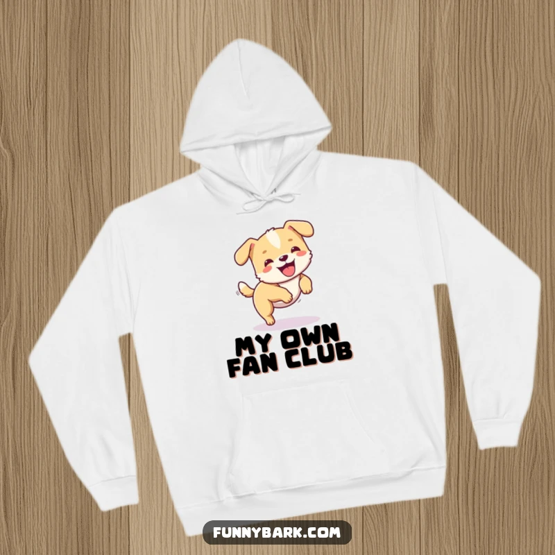 Funny dog hoodie showing a small dog happily chasing its tail in a spinning motion, perfect for cozy relaxation.